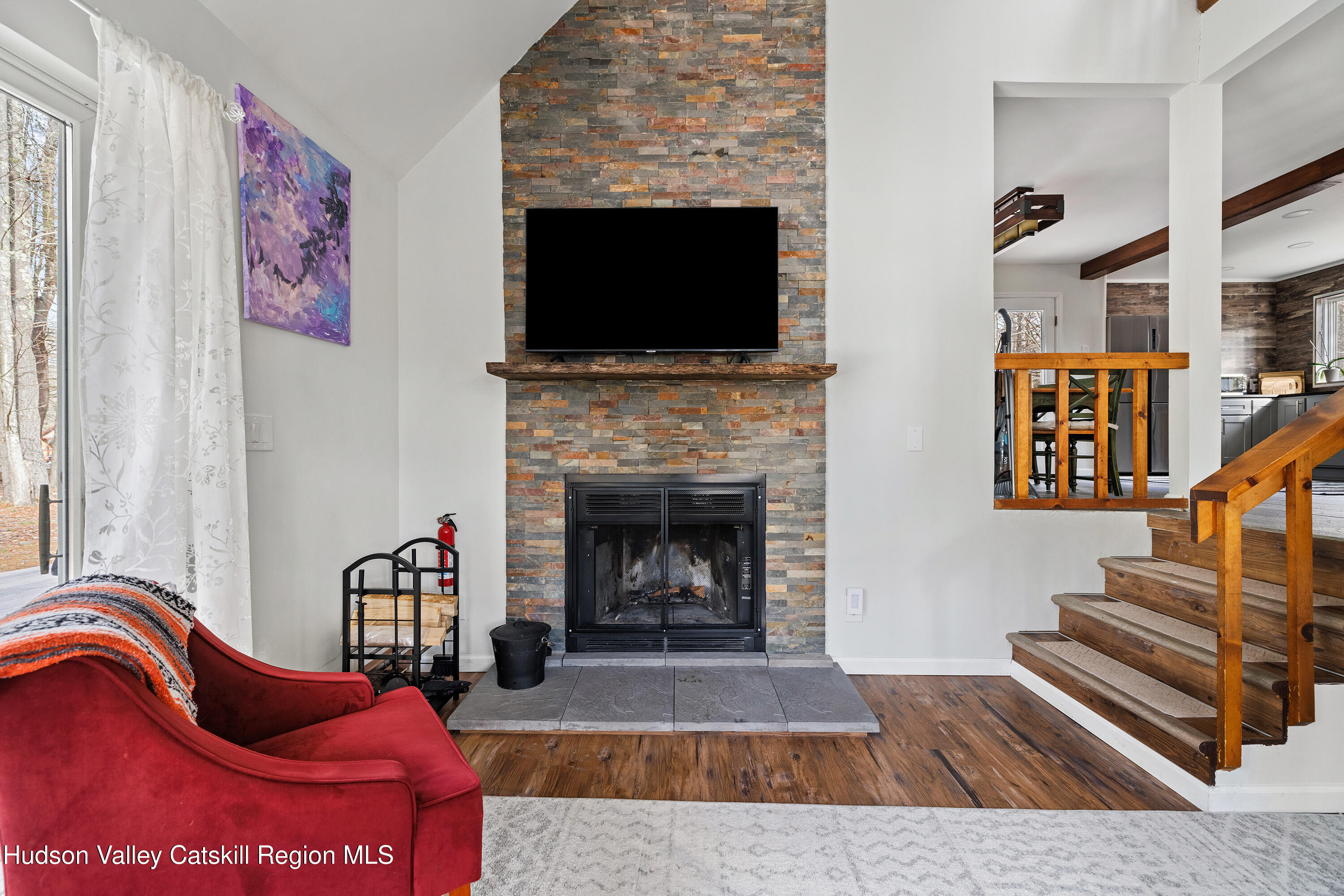 150 Vining Road Windham, NY 12496 - Photo 2 of 49 a living room with furniture fireplace and flat screen tv