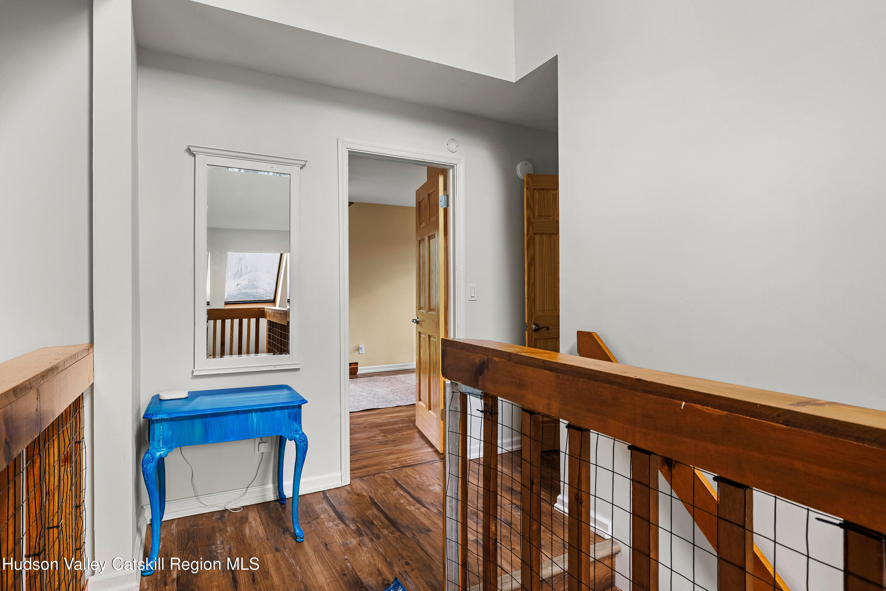 150 Vining Road Windham, NY 12496 - Photo 25 of 49 a view of a hallway with wooden floor and staircase