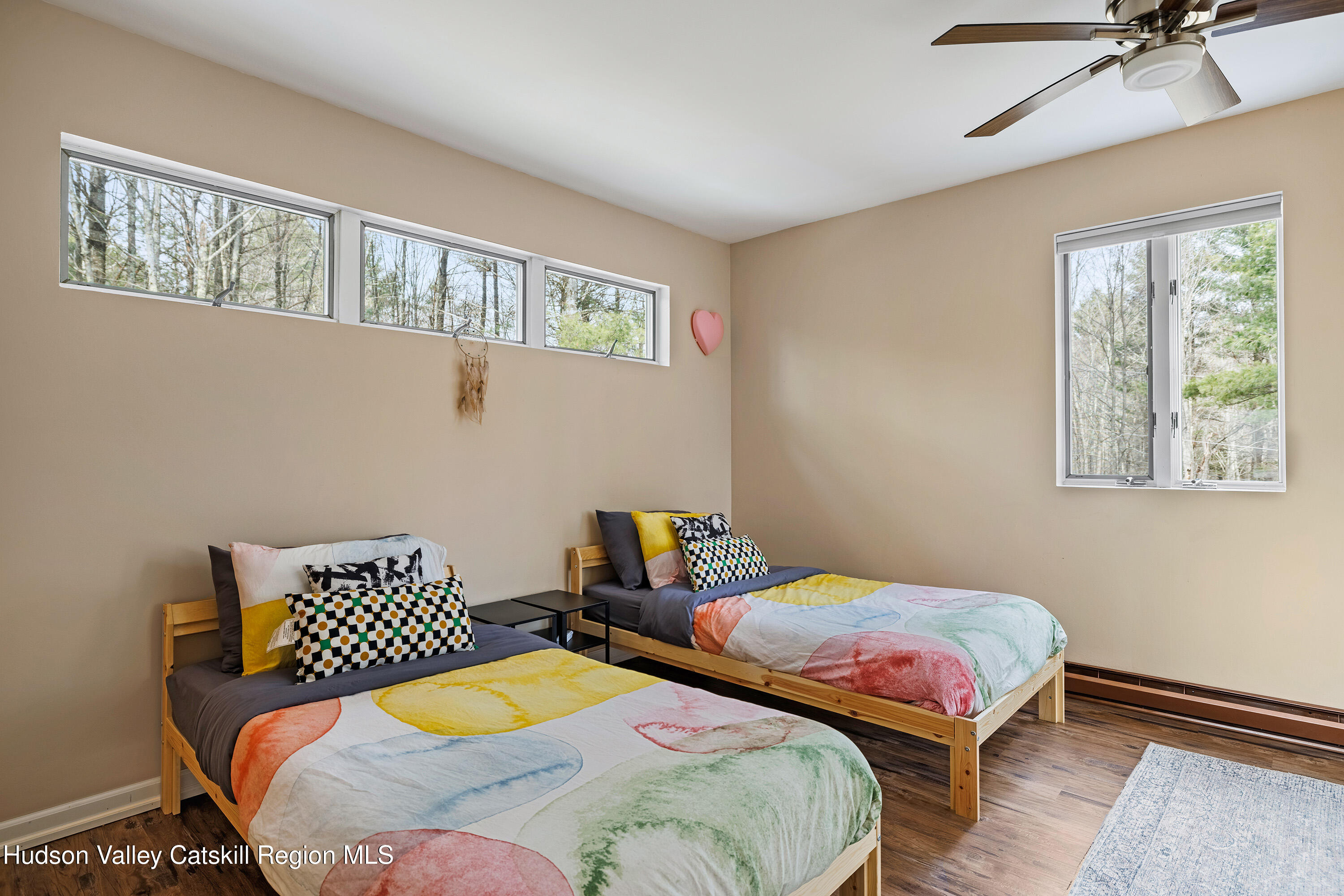 150 Vining Road Windham, NY 12496 - Photo 32 of 49 a bedroom with two beds and a window