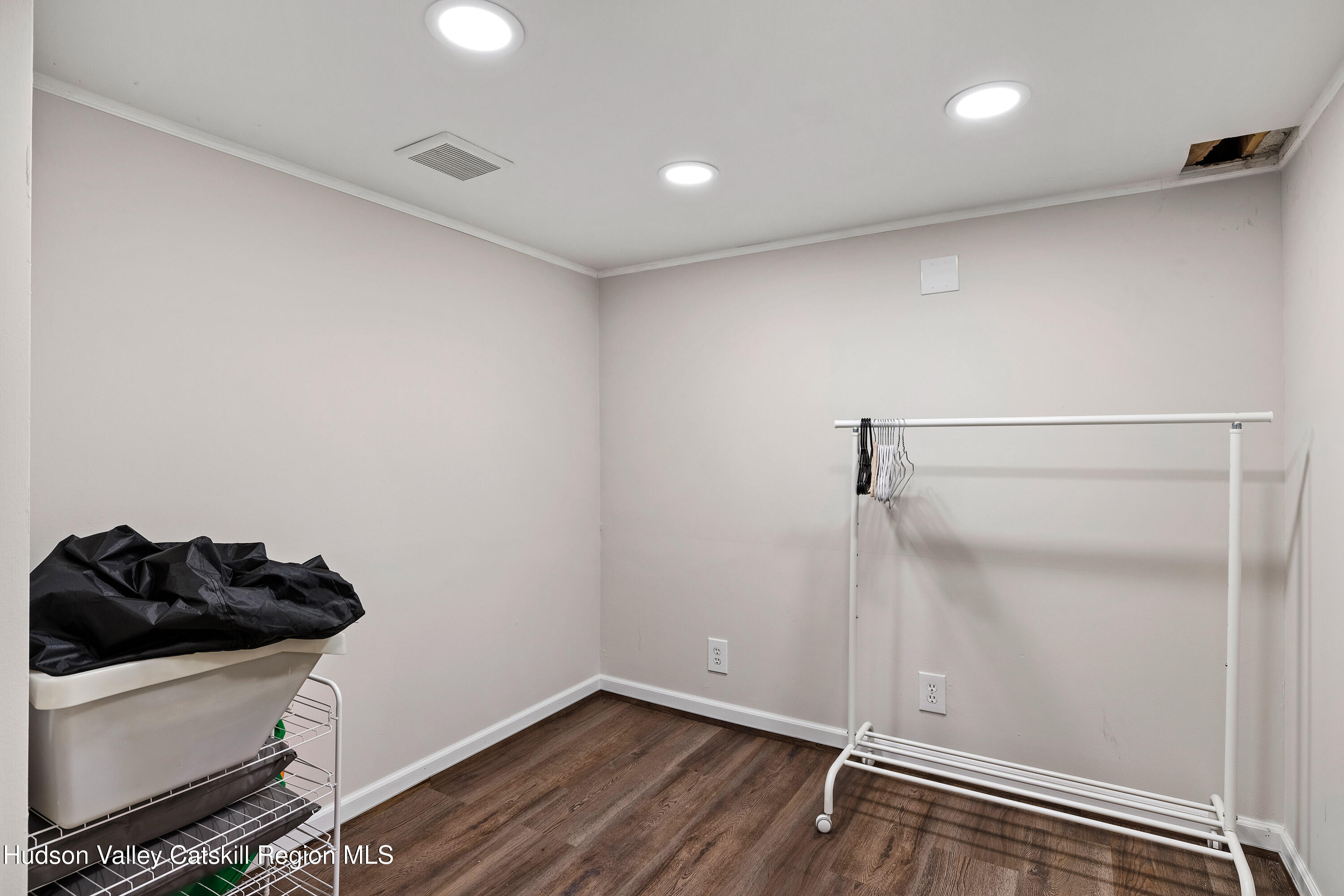 150 Vining Road Windham, NY 12496 - Photo 37 of 49 a big room with wooden floor and a window