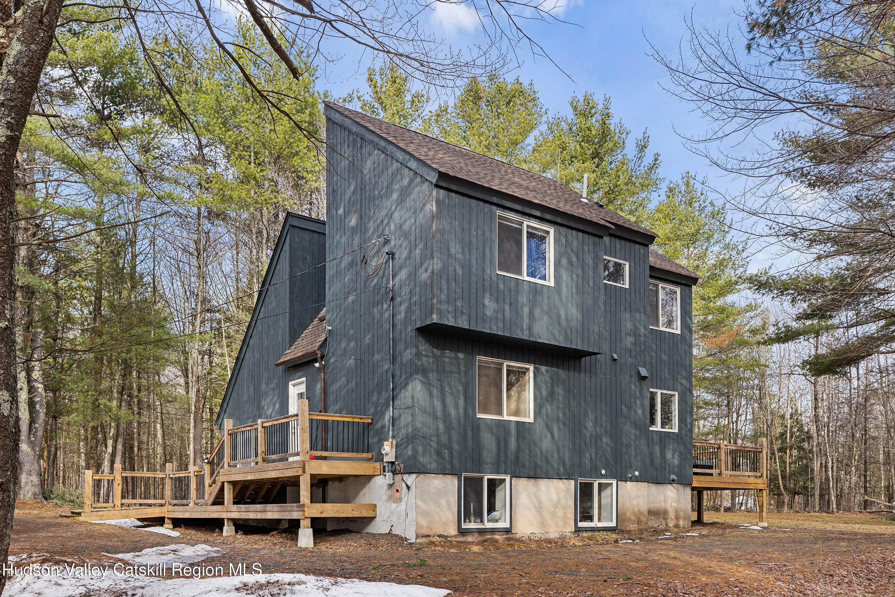 150 Vining Road Windham, NY 12496 - Photo 41 of 49 a front view of a building with a garden
