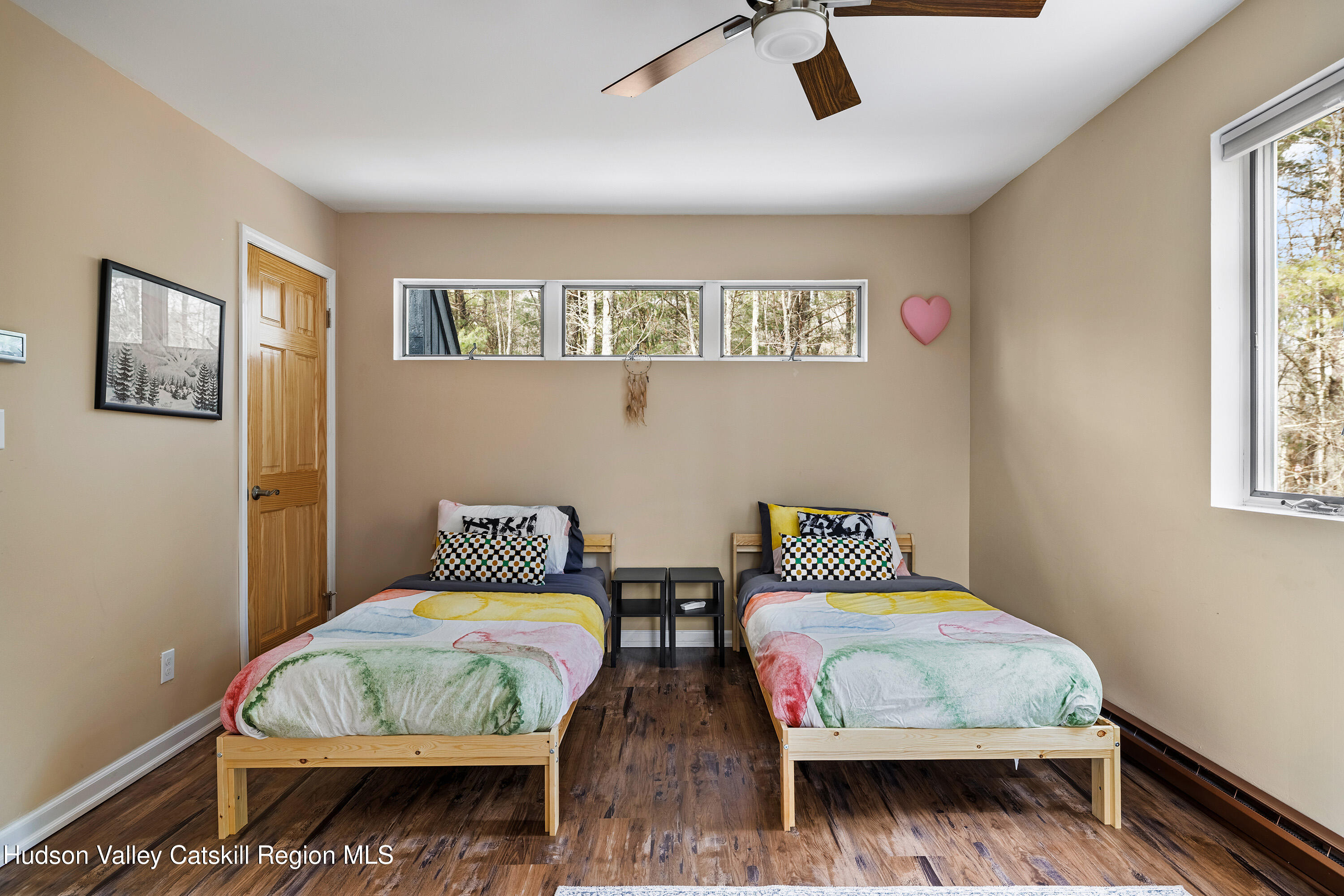 150 Vining Road Windham, NY 12496 - Photo 46 of 49 a bedroom with two beds and a window