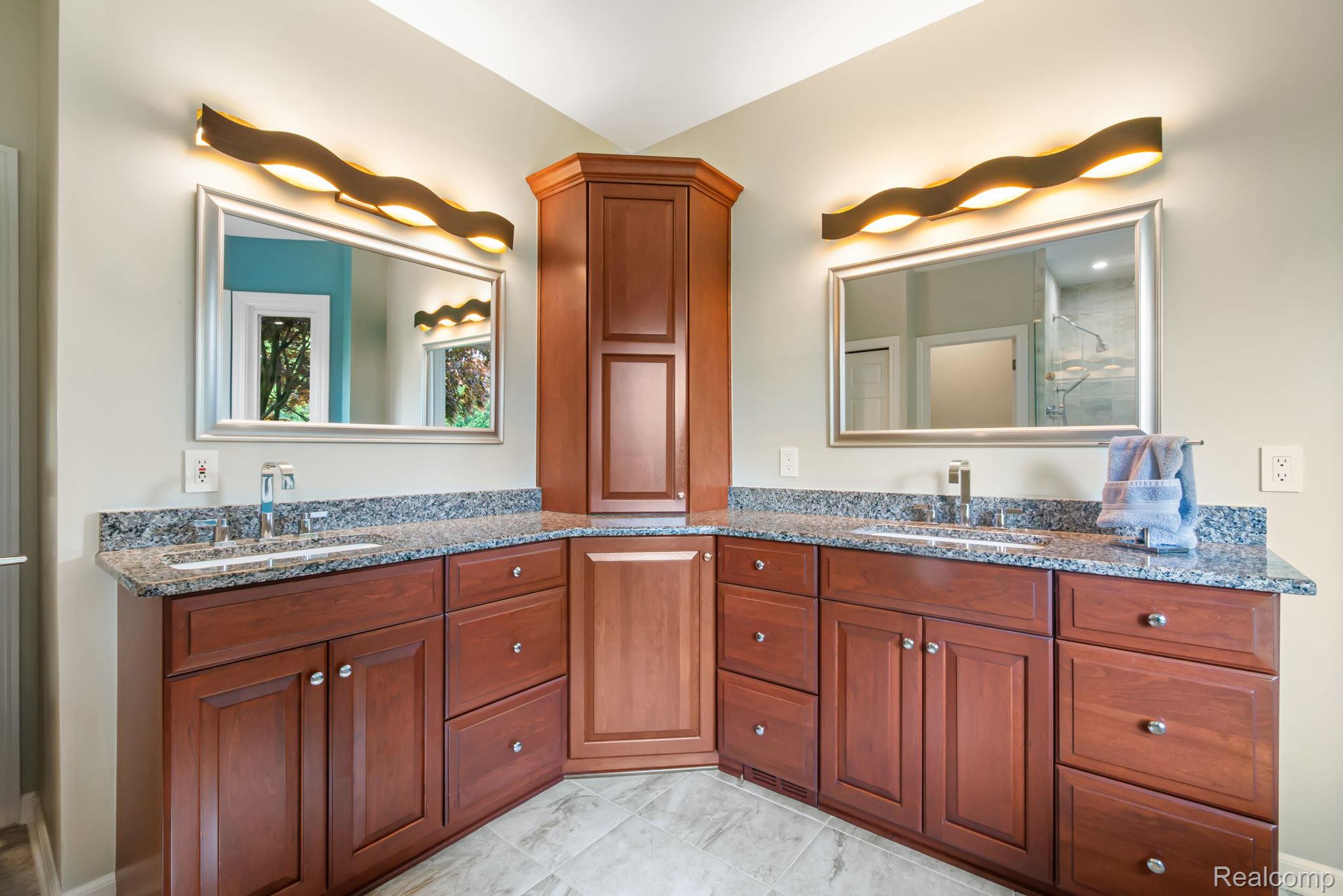 1902 Grayslake Drive Rochester, MI 48306 - Photo 28 of 76 Dual vanity with granite countertops, undermount sinks, and chrome faucets