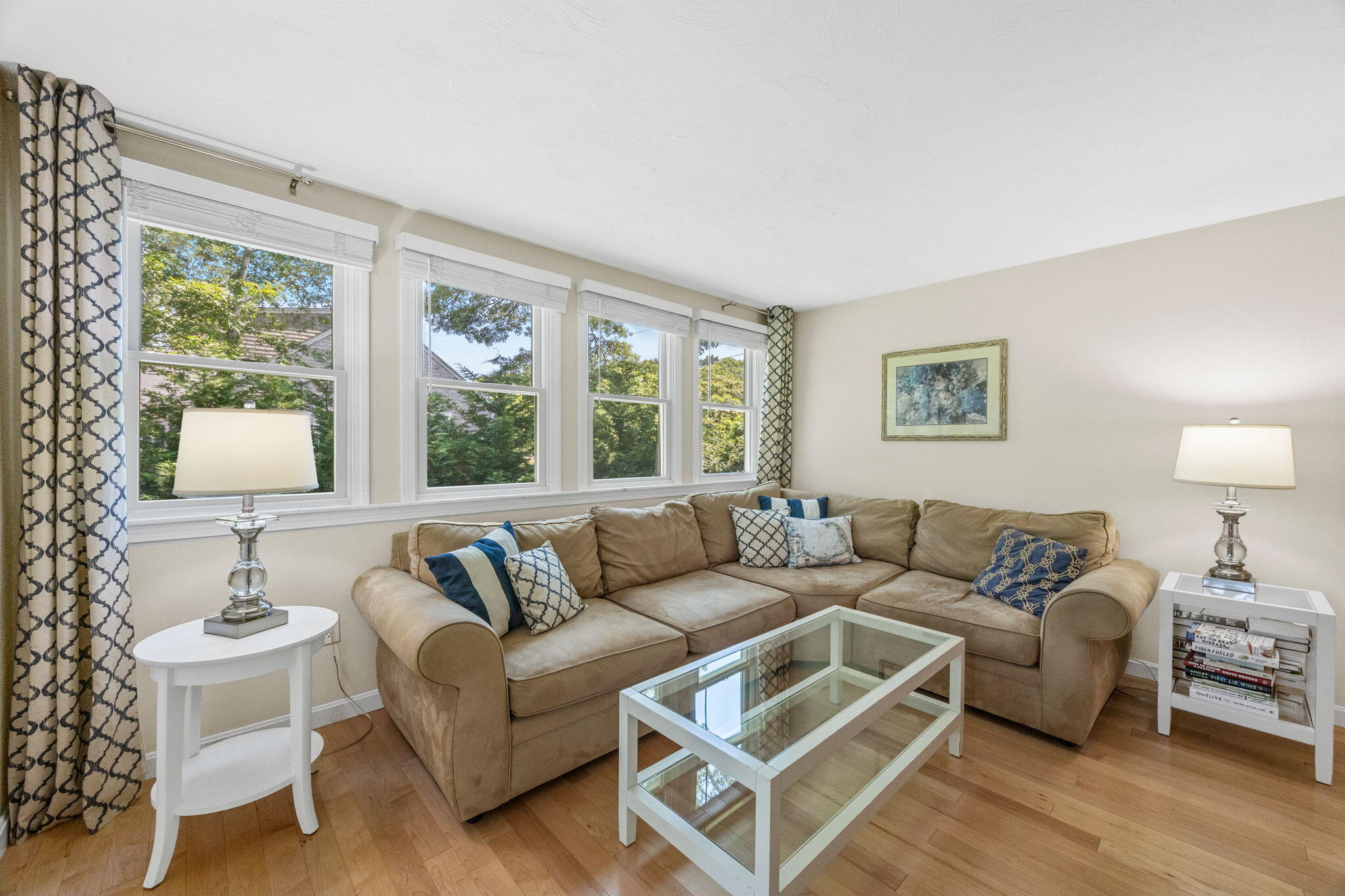 71 Potonumecot Road Chatham, MA 02633 - Photo 19 of 46 a living room with furniture and a large window