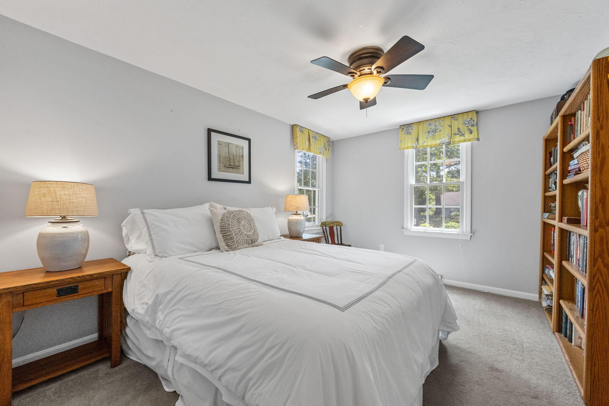 71 Potonumecot Road Chatham, MA 02633 - Photo 32 of 46 a bedroom with a large bed and a window