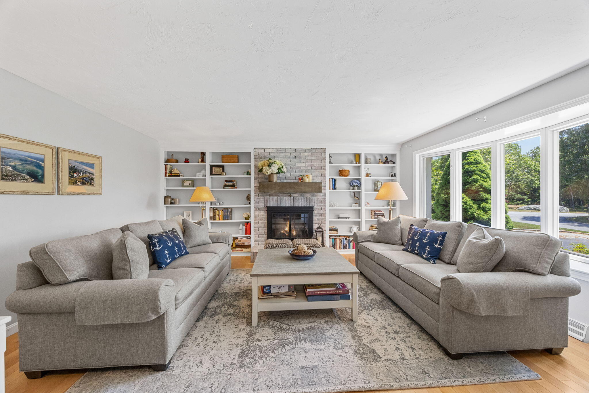 71 Potonumecot Road Chatham, MA 02633 - Photo 5 of 46 a living room with furniture and a fireplace