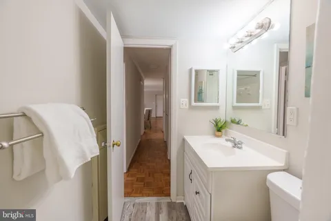 a bathroom with a sink and mirror