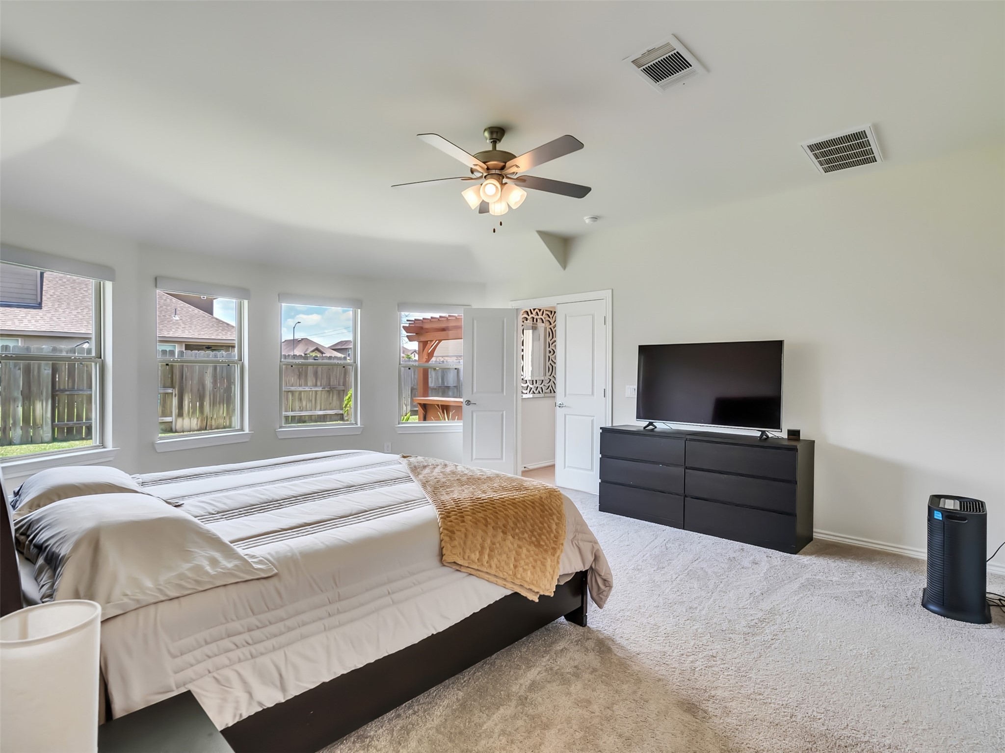 27997 Lone Hollow Lane Spring, TX 77386 - Photo 42 of 45 a bedroom with a bed and a couch
