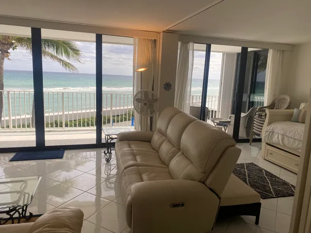 a bathroom with a bathtub and a window