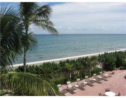 a kitchen with stainless steel appliances a sink stove and cabinets