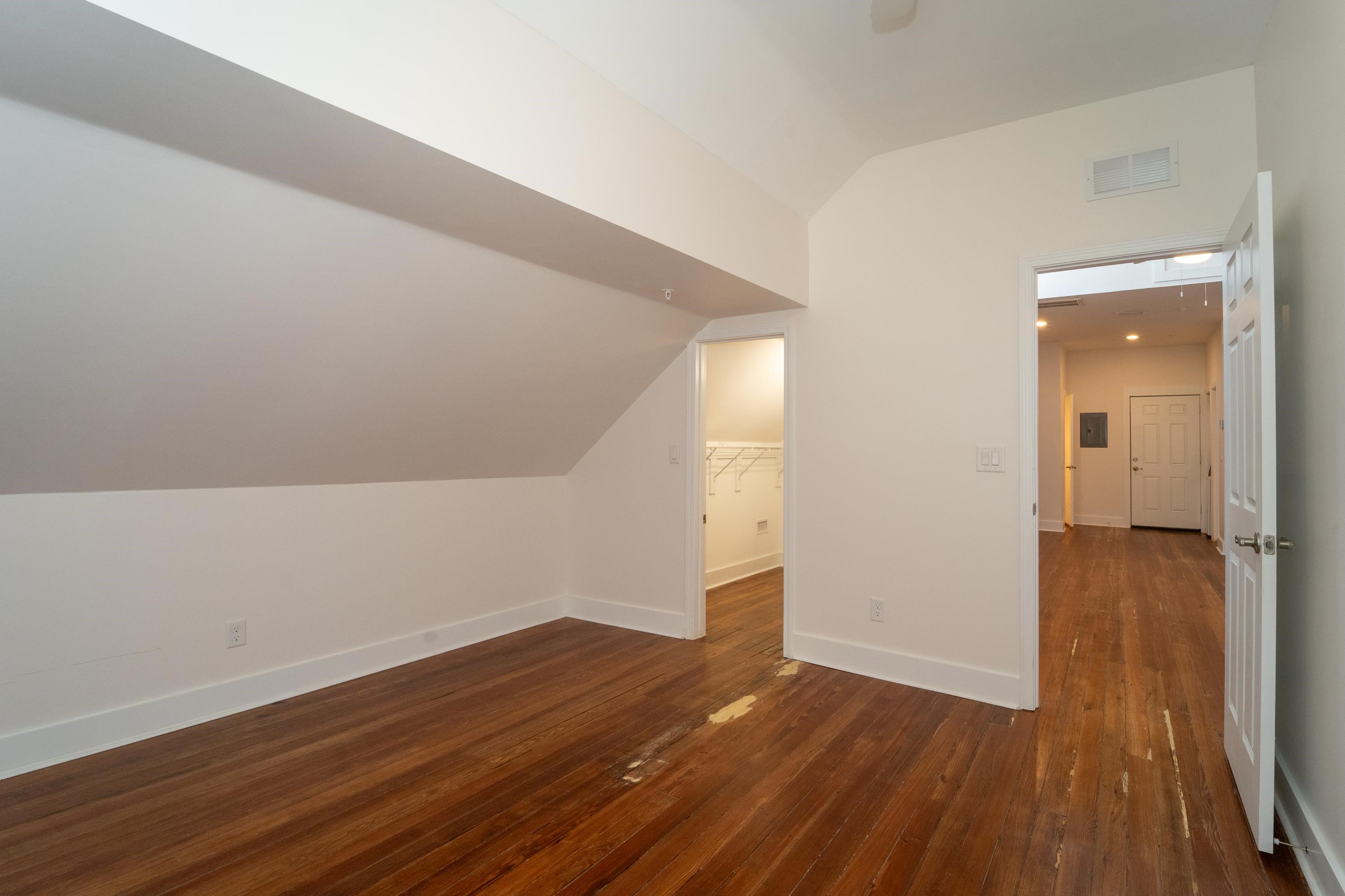 11 Aviles Street, Unit 3B St. Augustine, FL 32084 - Photo 12 of 17 wooden floor in an empty room
