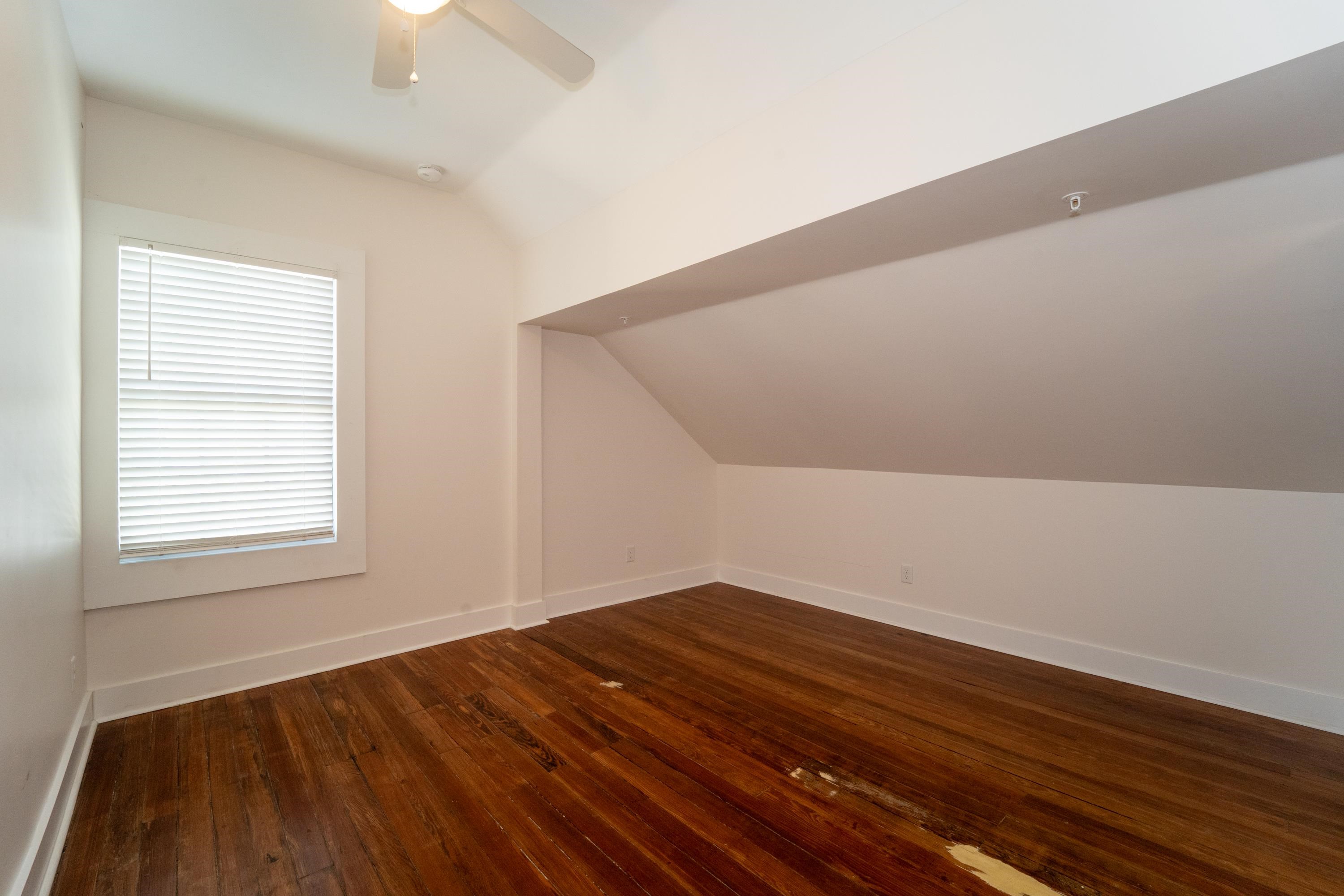 11 Aviles Street, Unit 3B St. Augustine, FL 32084 - Photo 13 of 17 a view of empty room with wooden floor