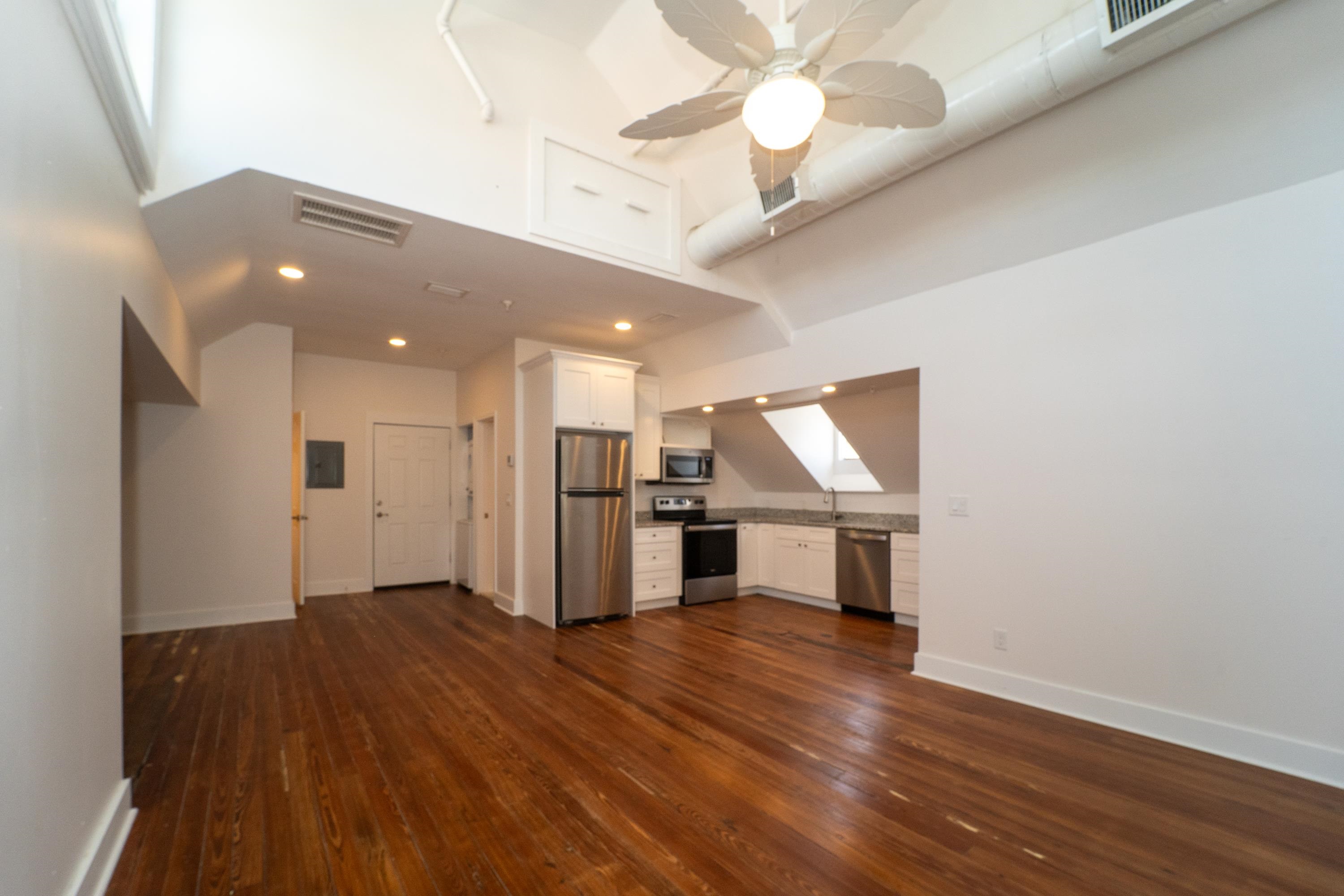 11 Aviles Street, Unit 3B St. Augustine, FL 32084 - Photo 7 of 17 a view of a kitchen with a sink and microwave