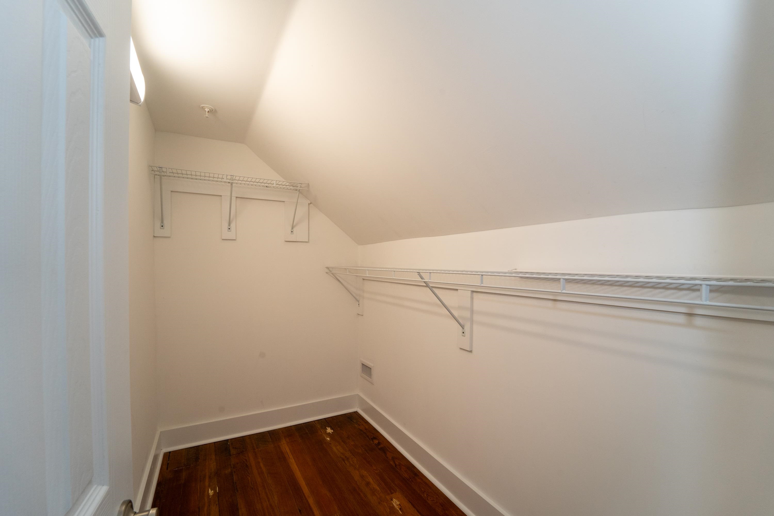 11 Aviles Street, Unit 3B St. Augustine, FL 32084 - Photo 8 of 17 a view of a room with racks on the wall