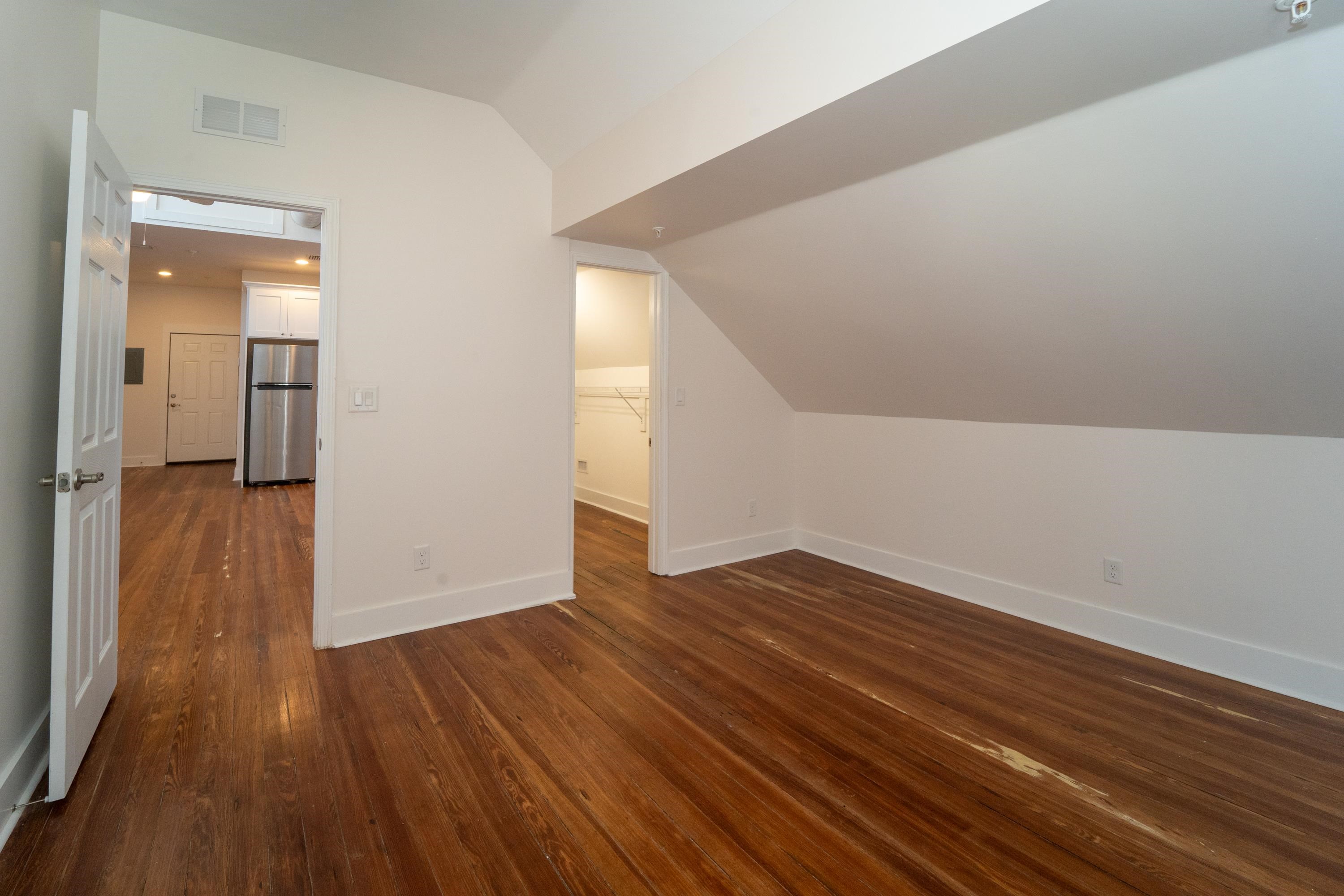 11 Aviles Street, Unit 3B St. Augustine, FL 32084 - Photo 9 of 17 a view of empty room with wooden floor