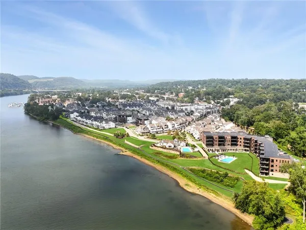 an aerial view of a swimming pool and outdoor space