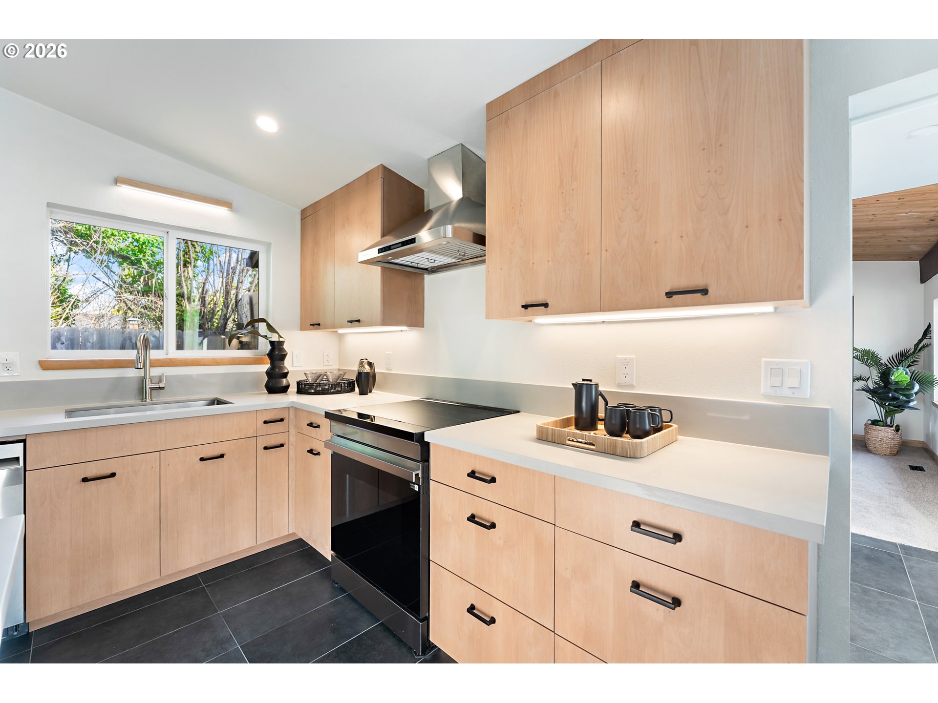 2437 Northeast 134th Place Portland, OR 97230 - Photo 17 of 40 a kitchen with a sink and cabinets
