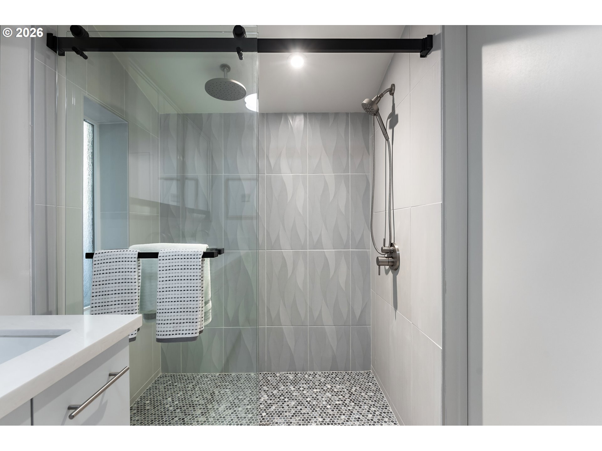 2437 Northeast 134th Place Portland, OR 97230 - Photo 23 of 40 a bathroom with a shower and a sink