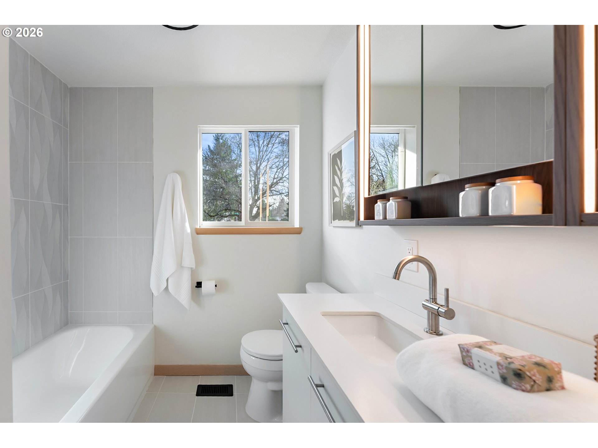 2437 Northeast 134th Place Portland, OR 97230 - Photo 29 of 40 a bathroom with a toilet sink and mirror