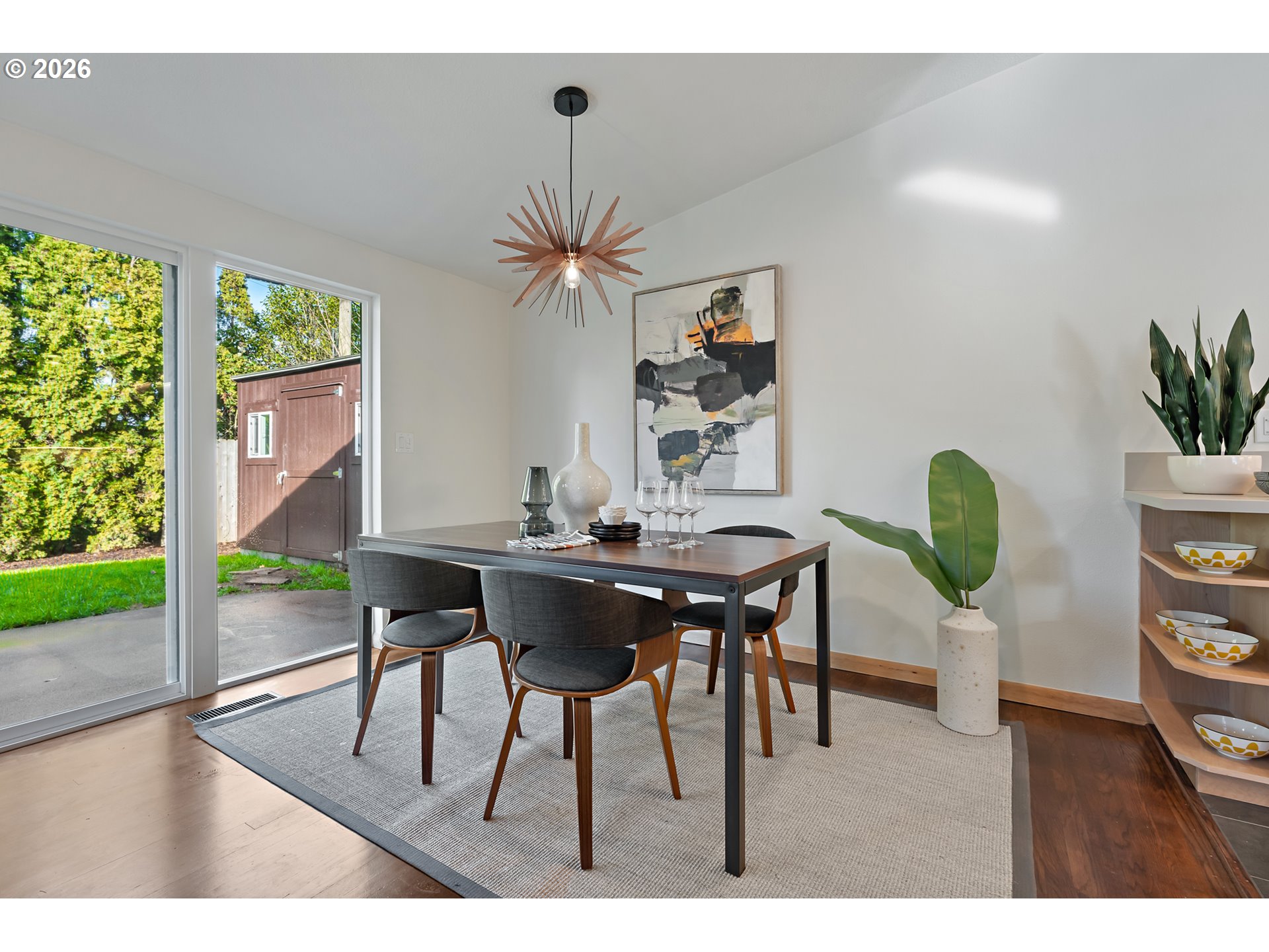 2437 Northeast 134th Place Portland, OR 97230 - Photo 8 of 40 a view of a dining room with furniture and wooden floor