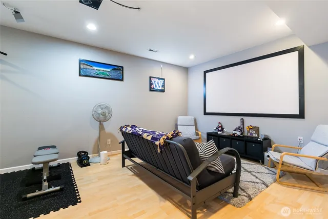 a outdoor space with wooden floor and furniture