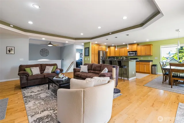 a living room with furniture and a table