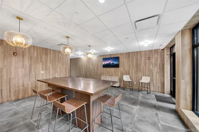 a kitchen with a table and chairs in it