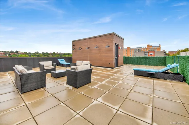 a view of a terrace with furniture