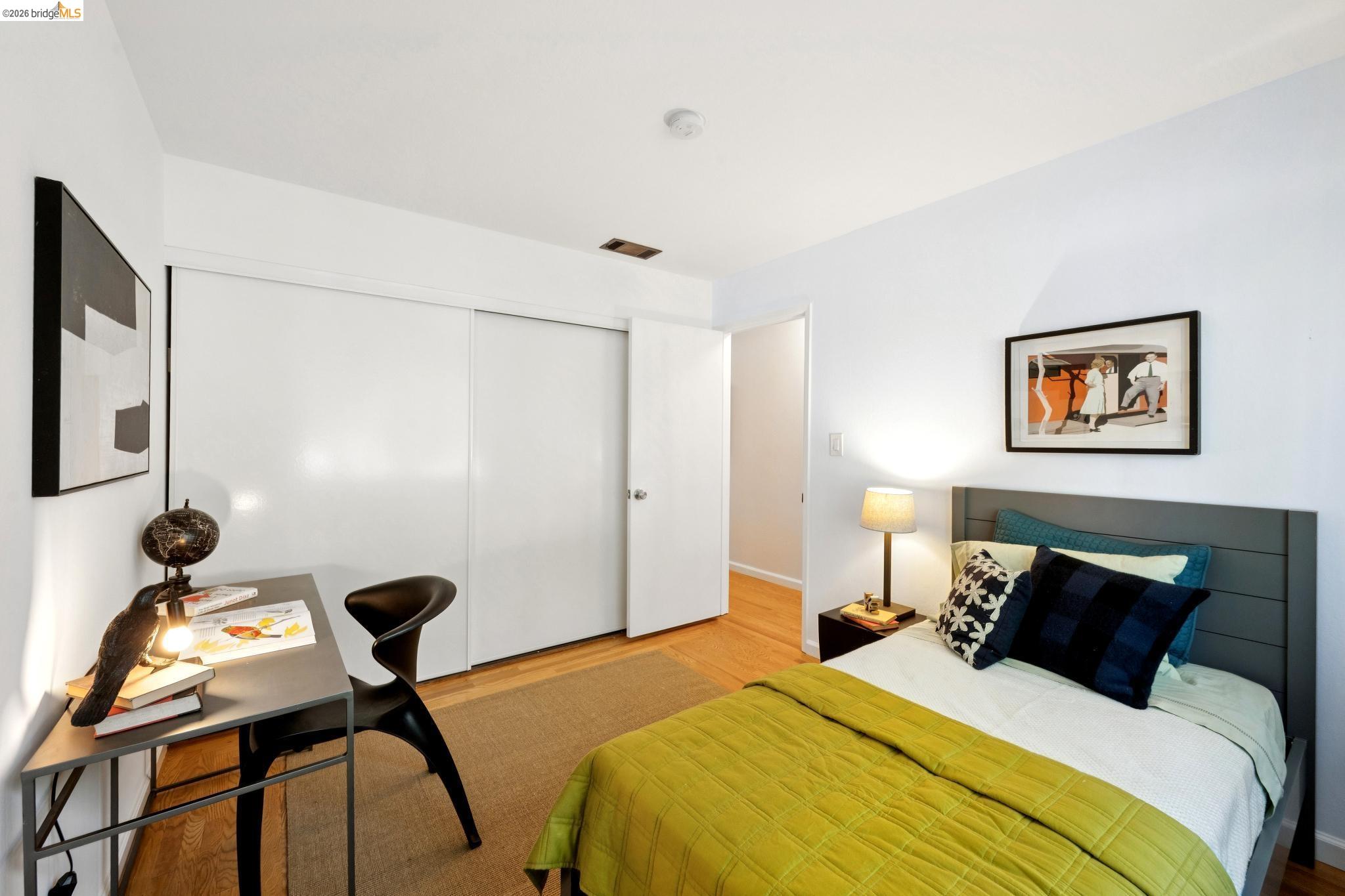 1340 Henry Street Berkeley, CA 94709 - Photo 41 of 52 Bedroom featuring wood-finish flooring, white walls, and a recessed light fixture