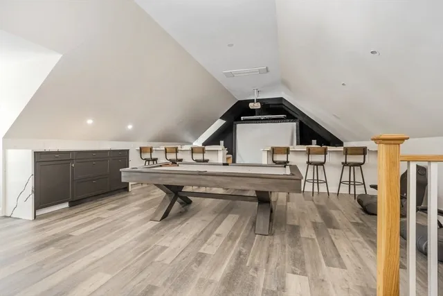 a view of workspace with wooden floor