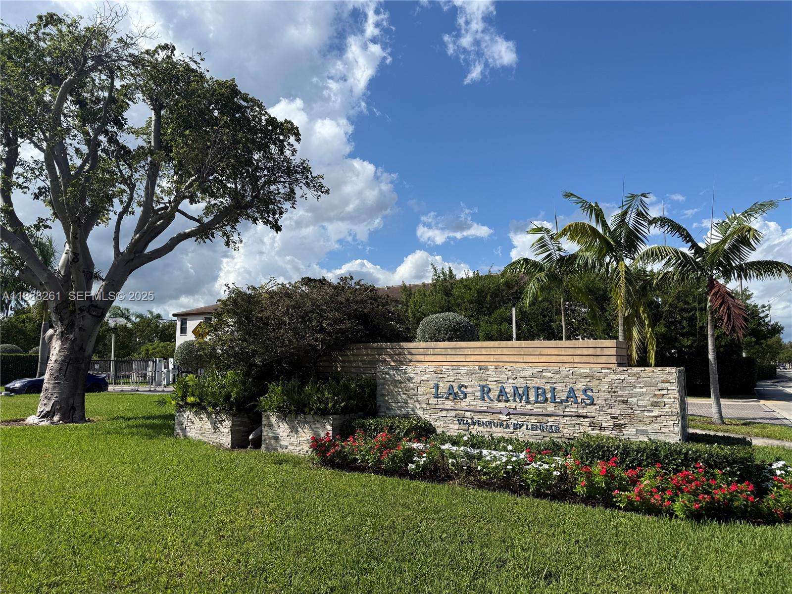400 Northeast 208th Terrace, Unit 400 Miami, FL 33179 - Photo 18 of 53 a view of garden with house
