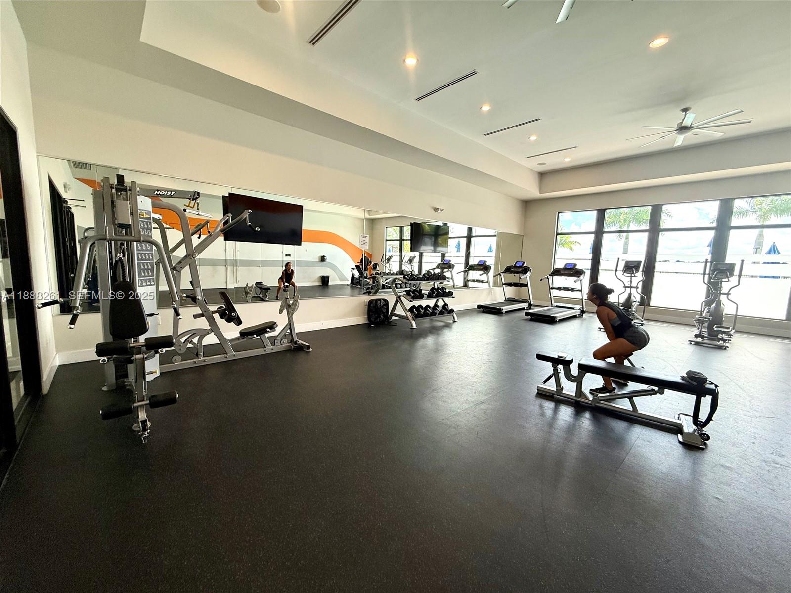 400 Northeast 208th Terrace, Unit 400 Miami, FL 33179 - Photo 20 of 53 a view of a room with gym equipment