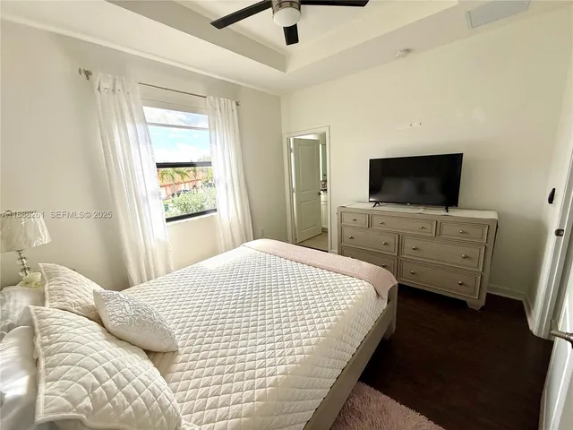 a kitchen with a stove a microwave and refrigerator