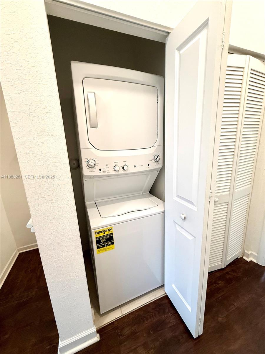 400 Northeast 208th Terrace, Unit 400 Miami, FL 33179 - Photo 39 of 53 a utility room with dryer and washer