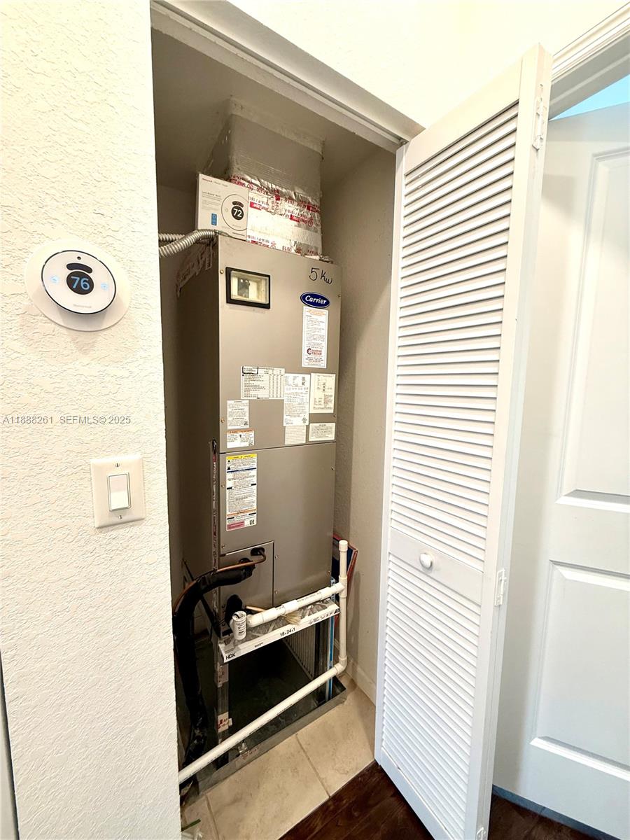 400 Northeast 208th Terrace, Unit 400 Miami, FL 33179 - Photo 40 of 53 AC Closet