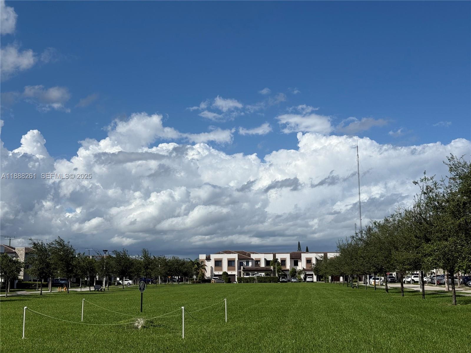 400 Northeast 208th Terrace, Unit 400 Miami, FL 33179 - Photo 46 of 53 a view of building with outdoor space