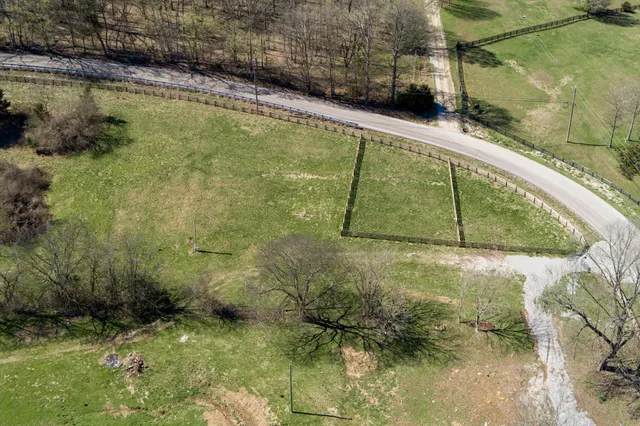 an aerial view of residential house with outdoor space