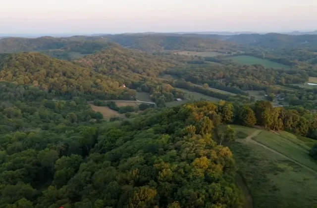 an aerial view of residential house with outdoor space