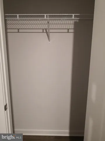 a bathroom with a toilet and a bathtub