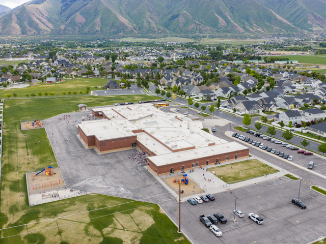 646 South Meade Street Mapleton, UT 84664 - Photo 43 of 46 Aerial perspective showcasing a community with residential properties and a central school building