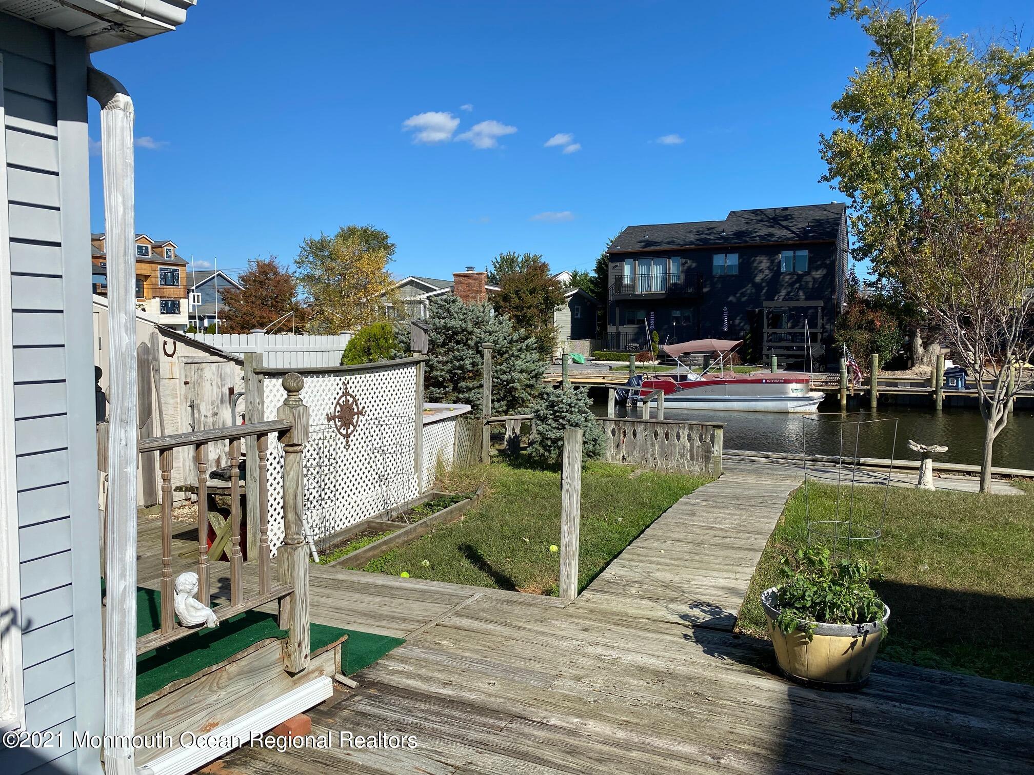 65 Topsail Road Brick, NJ 08723 - Photo 14 of 15 a view of house with patio outdoor seating