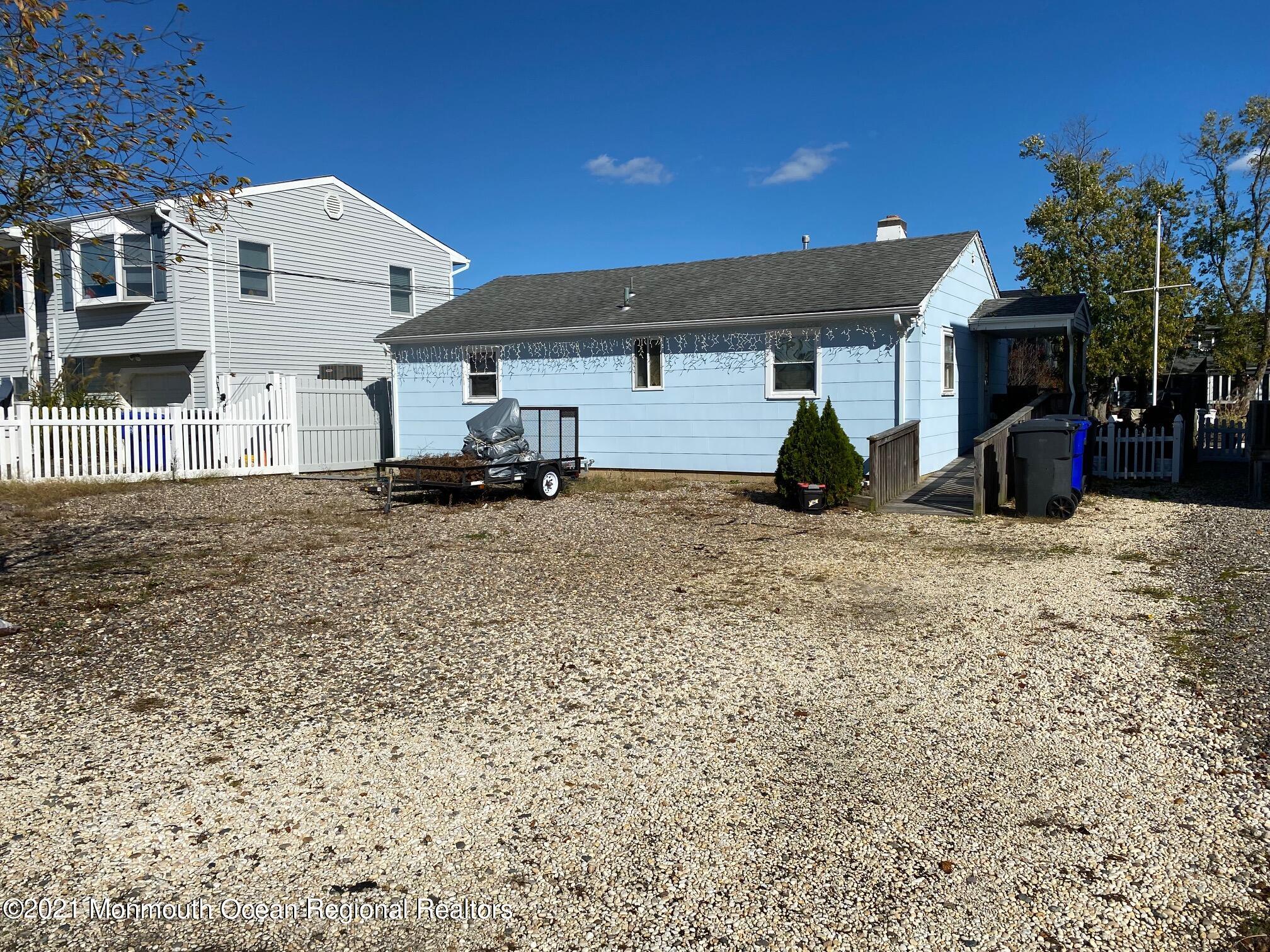 65 Topsail Road Brick, NJ 08723 - Photo 8 of 15 a view of a house with a yard