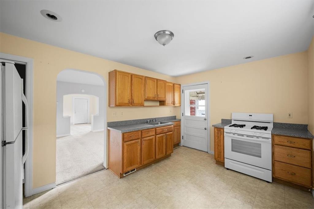 9 Spring Street Millvale, PA 15209 - Photo 11 of 22 Kitchen and door leading to the side patio