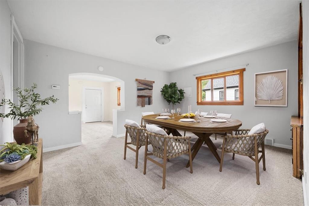 9 Spring Street Millvale, PA 15209 - Photo 7 of 22 Large dining room measuring 15x13 and virtually staged