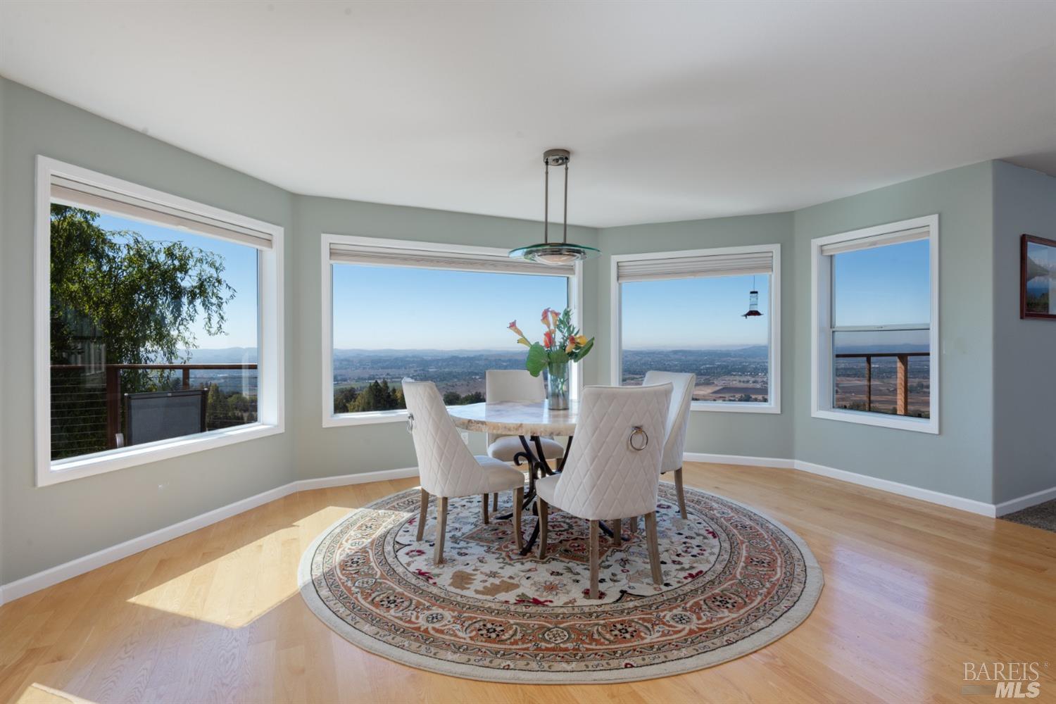4133 Orr Ranch Road Santa Rosa, CA 95404 - Photo 18 of 50 a view of a dining room with furniture window and wooden floor