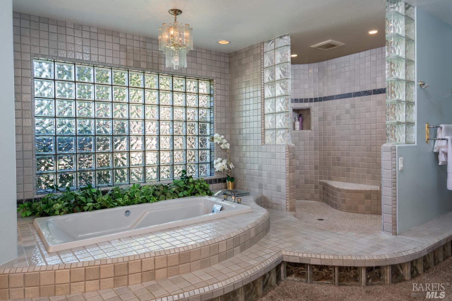 4133 Orr Ranch Road Santa Rosa, CA 95404 - Photo 32 of 50 a bathroom with a tub and shower