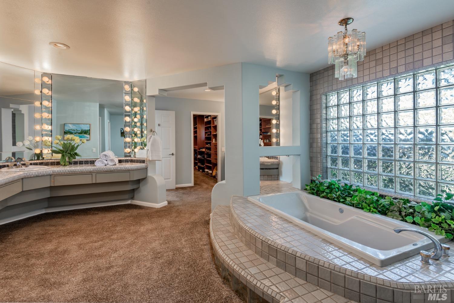 4133 Orr Ranch Road Santa Rosa, CA 95404 - Photo 33 of 50 a spacious bathroom with a tub and shower