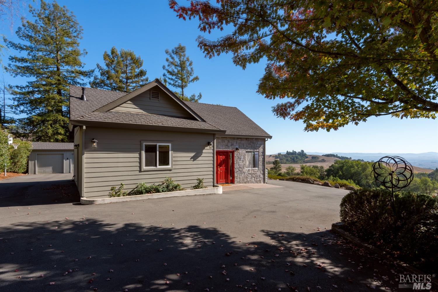 4133 Orr Ranch Road Santa Rosa, CA 95404 - Photo 38 of 50 a front view of a house with a yard and garage