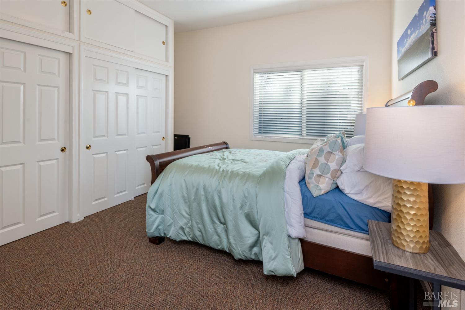 4133 Orr Ranch Road Santa Rosa, CA 95404 - Photo 42 of 50 a bedroom with a bed and a window