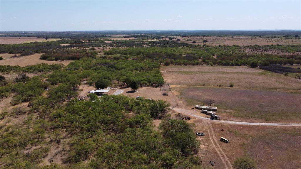 1789 Taack Road Olney, TX 76374 - Photo 7 of 18 Expansive rural landscape featuring a mix of open fields and scattered treed areas